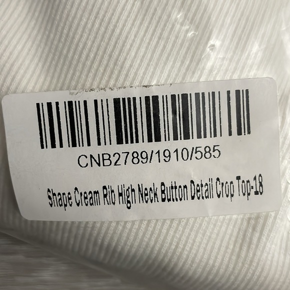 PRETTY LITTLE THING | (18) SHAPE CREAM RIB HIGH NECK BUTTON DETAIL CROP TOP - Picture 8 of 9